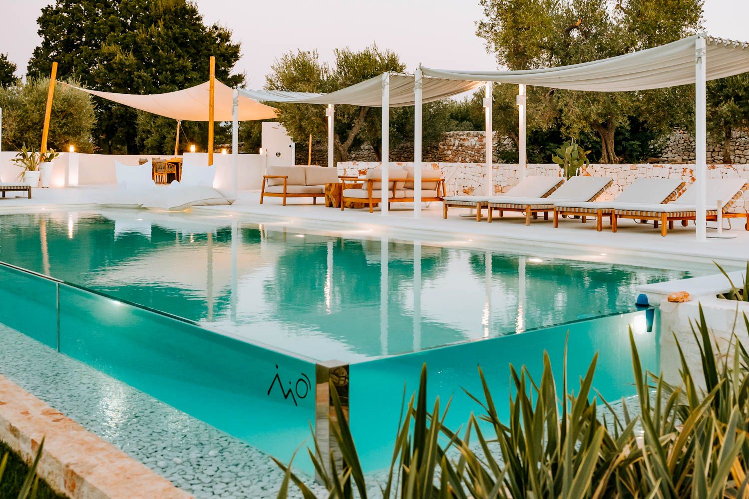 Trullo Acanto infinity pool with countryside views and modern pergola, Cisternino, Puglia, Italy
