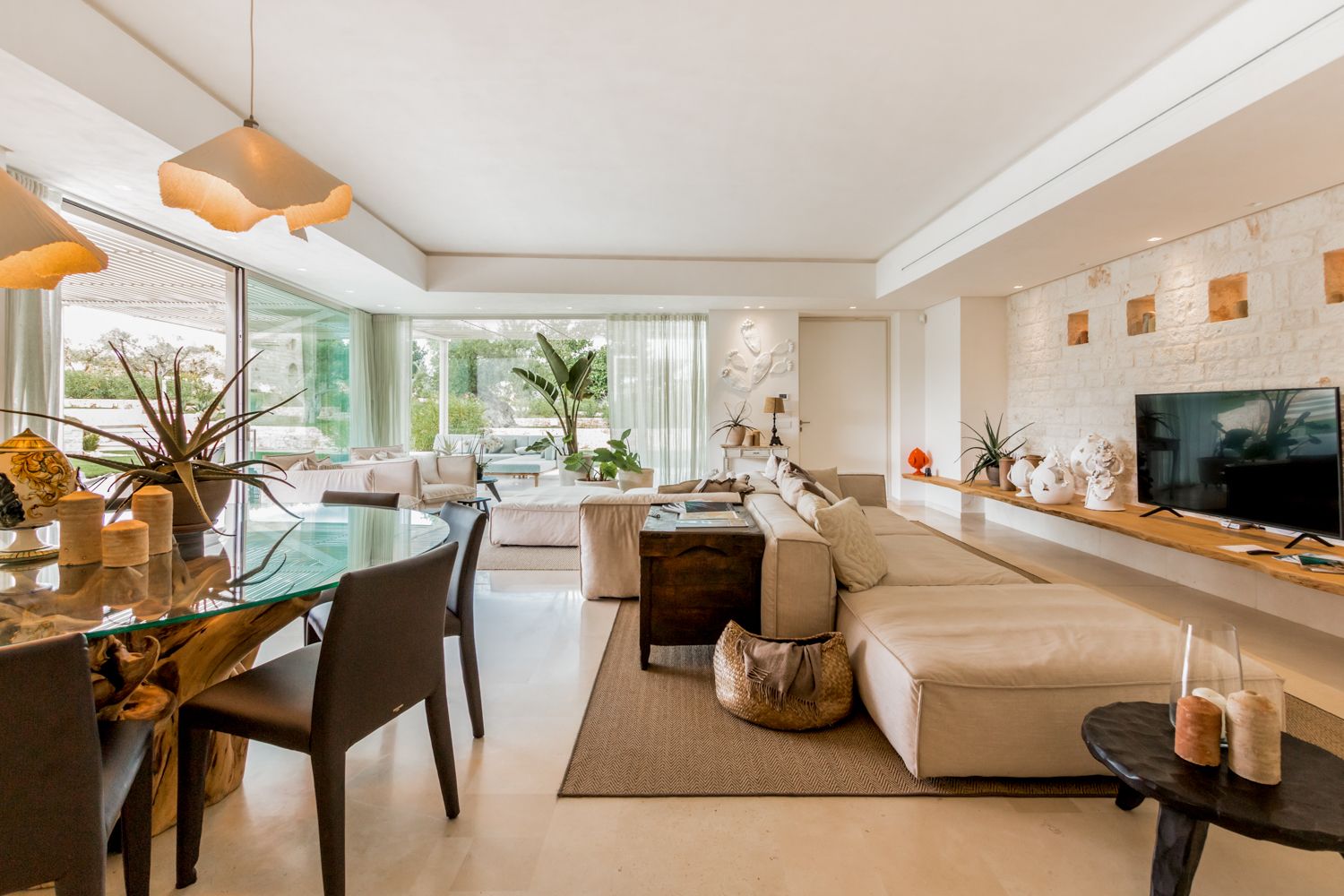 Trullo Barbagianni living room with open-plan design and pool terrace, Cisternino, Puglia, Italy