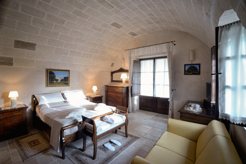 Sublimia master bedroom with vaulted stone ceiling, Ceglie Messapica, Apulia, Italy