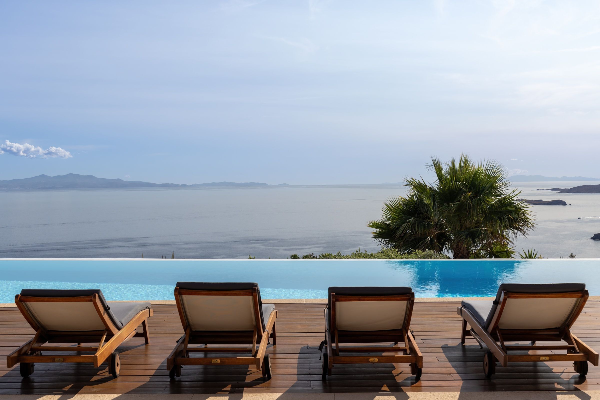 Villa Infinite Breeze infinity edge pool overlooking Greek islands, Mykonos, Greece