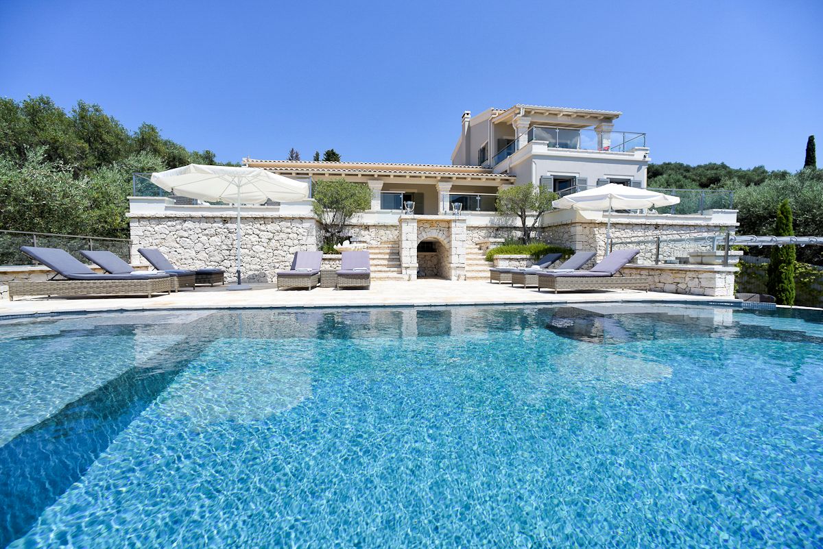 Villa Pearl luxury villa exterior with infinity pool overlooking the Ionian Sea, Kassiopi, Greece
